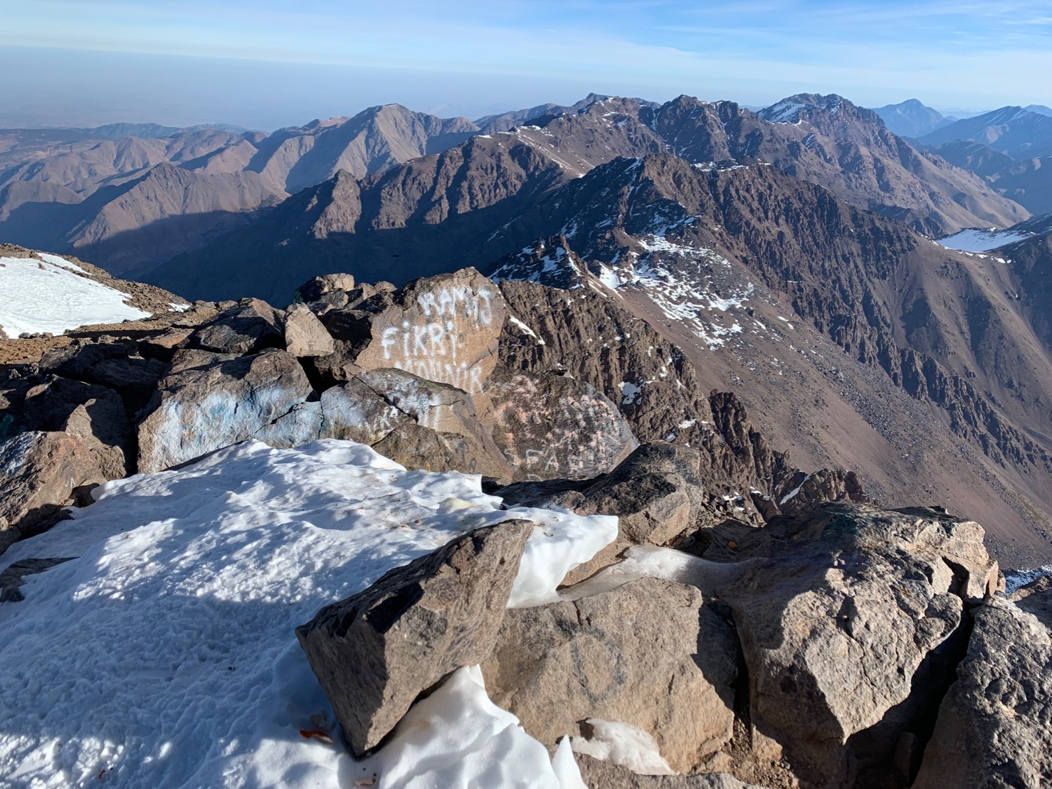 Rocks, snow and mountains. This is the view from the top of Mount Toubkal