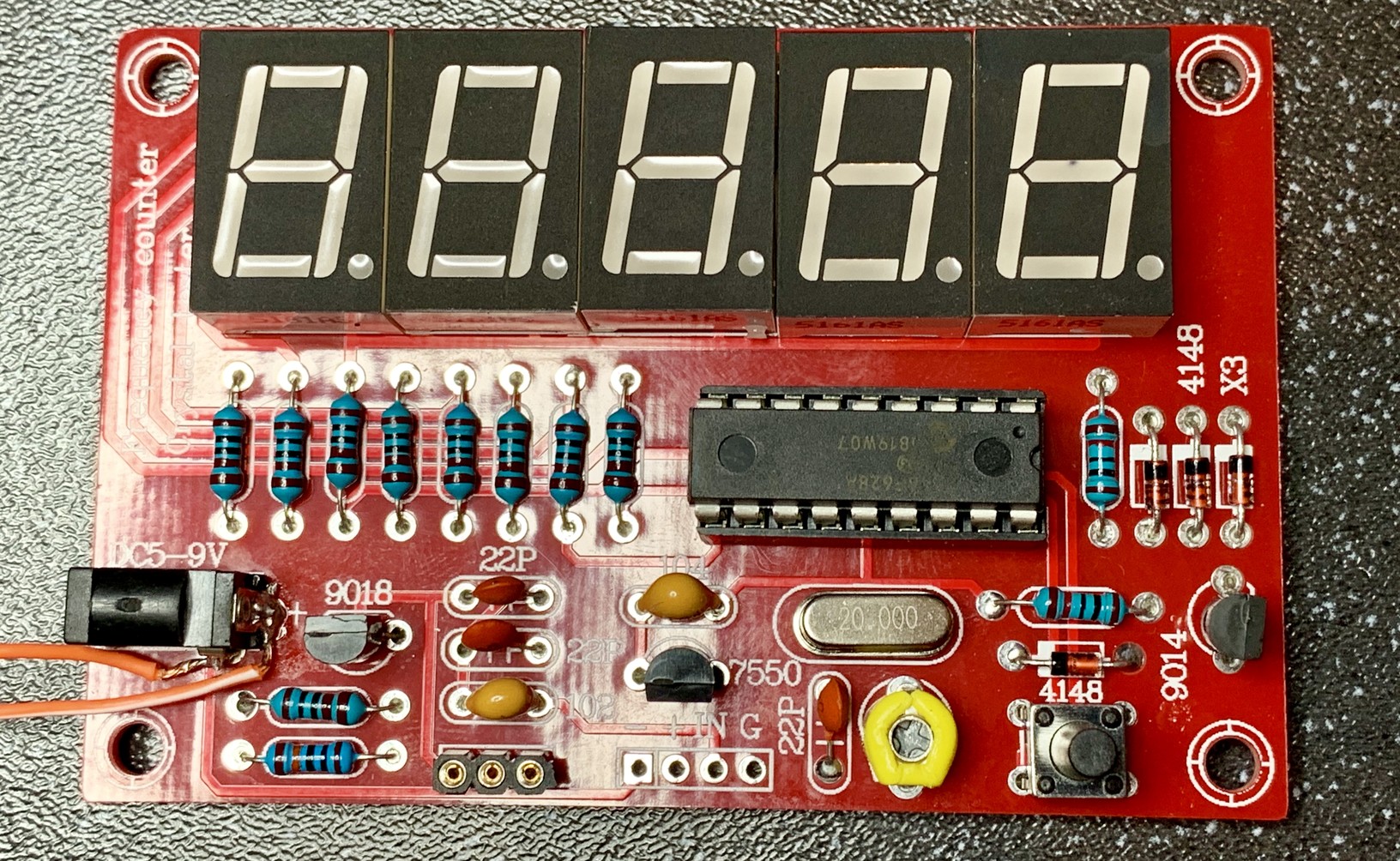 A cheap eBay crystal analyser. This is a small PCB with a row of five seven-segment displays, a PIC chip and a few other components.